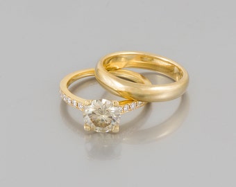 pair of engagement rings beautiful gold and diamond