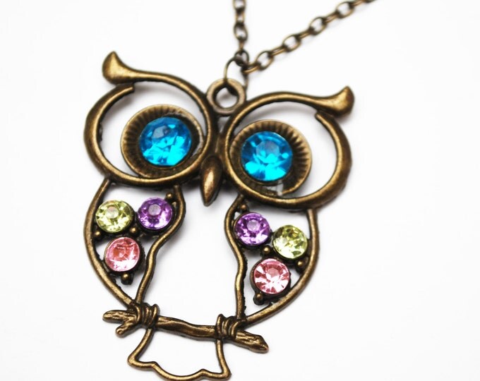 Rhinestone Owl Necklace of a brassy bronze metal and colorful stones