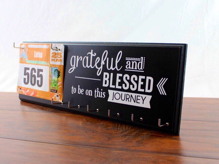 Running medal holder and race bib hanger by StrutYourStuffSignCo