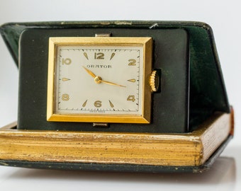 Vintage Swiss Orator Travel Clock in a Tooled Leather Book Case Miniature Book Form Travel Watch