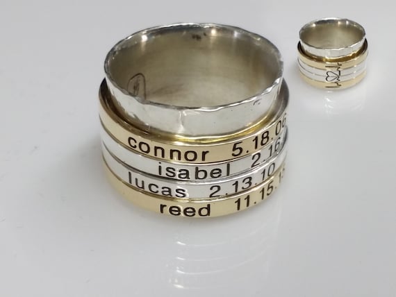 Spinner ring. Sterling silver ring with 4 custom engraved spinners. Completely customized, personalized, and unique.