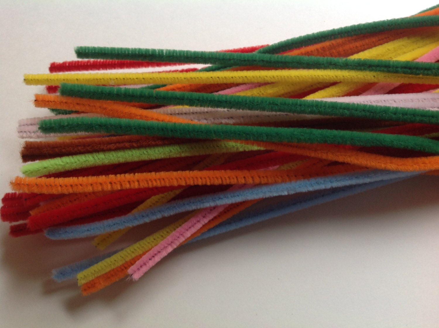 Supply of colored chenille stem pipe cleaners crafting tool