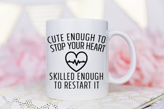 Cute Enough To Stop Your Heart, Skilled Enough to Restart it Mug