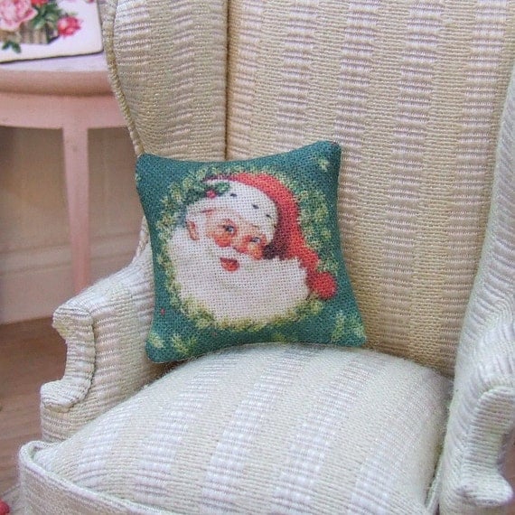 Santa cushion makes any dollhouse chair feel like Christmas - How to Decorate Your Dollhouse For Christmas in 1:12 Scale - Divine Miniatures