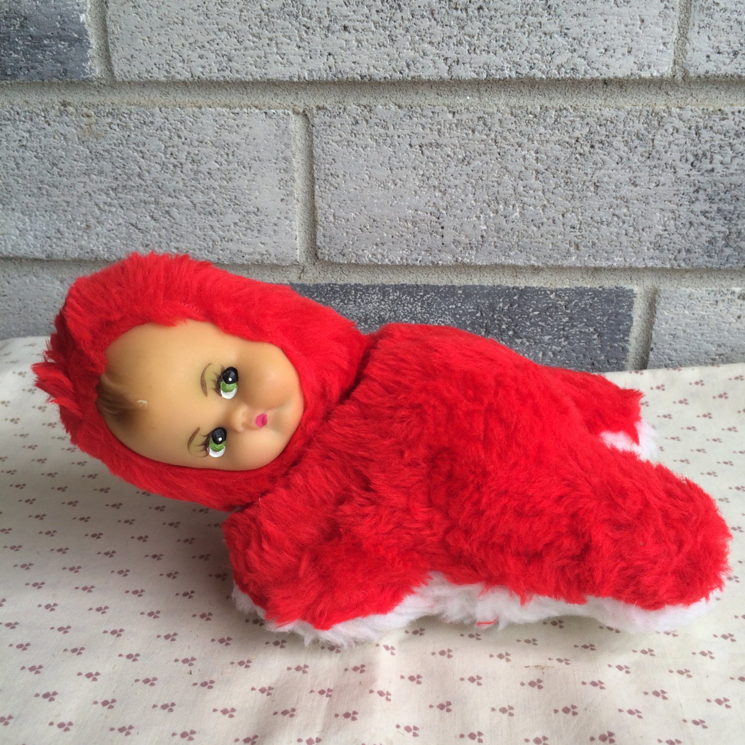 red and white doll