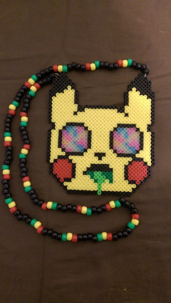 Items similar to Pikachu on Acid Perler/ Kandi Necklace (glow bead eyes