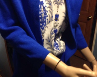 Skirt, sleeveless top and matching 3/4 jacket-