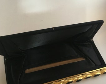 black clutch with gold detail