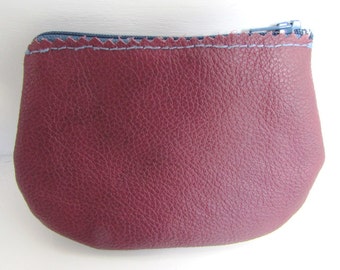 Dark red leather purse - 100% cotton grey and cream flower printed fabric lining - contrasting stitching - air force blue zip fastening