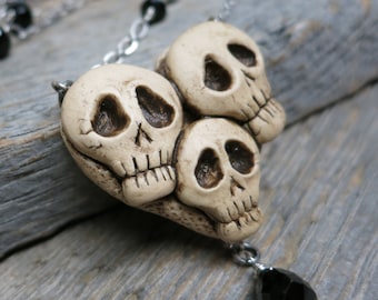 Catacombs necklace ... antique skull cluster / black spinel / black onyx / swarovski
