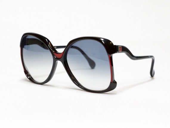 Oversized vintage sunglasses by Molyneux in black and red