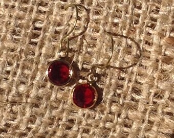 Red Swarovski Crystal Chanel drop earrings dangle from gold niobium wires