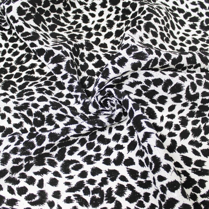 Flocked Sequins Fabric in Black and White Leopard by StylishFabric