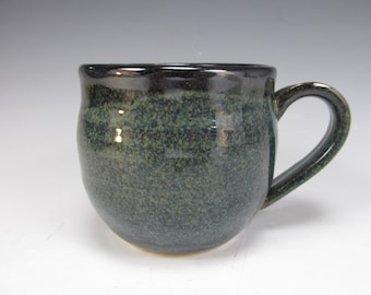 Handmade, stoneware coffee mug. Blue, black and white tea cup