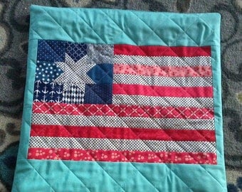 Scrappy Red, white, and blue flag with turquoise background pillow cover