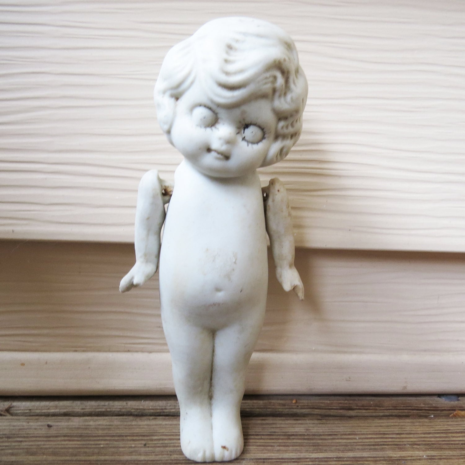 porcelain kewpie doll