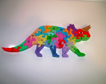 wooden dinosaur alphabet puzzle