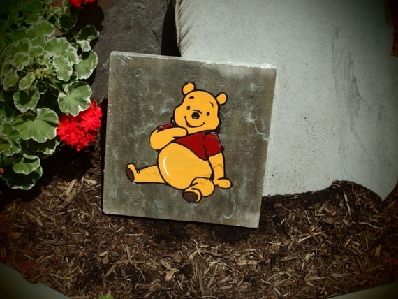 winnie the pooh stone statue