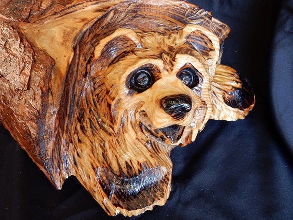 Chainsaw Carving Bear Cub in a Log