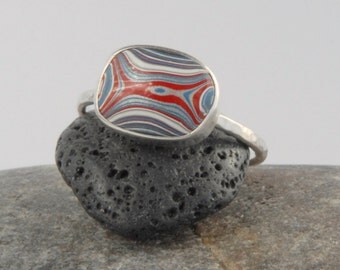 Sterling silver and fordite ring