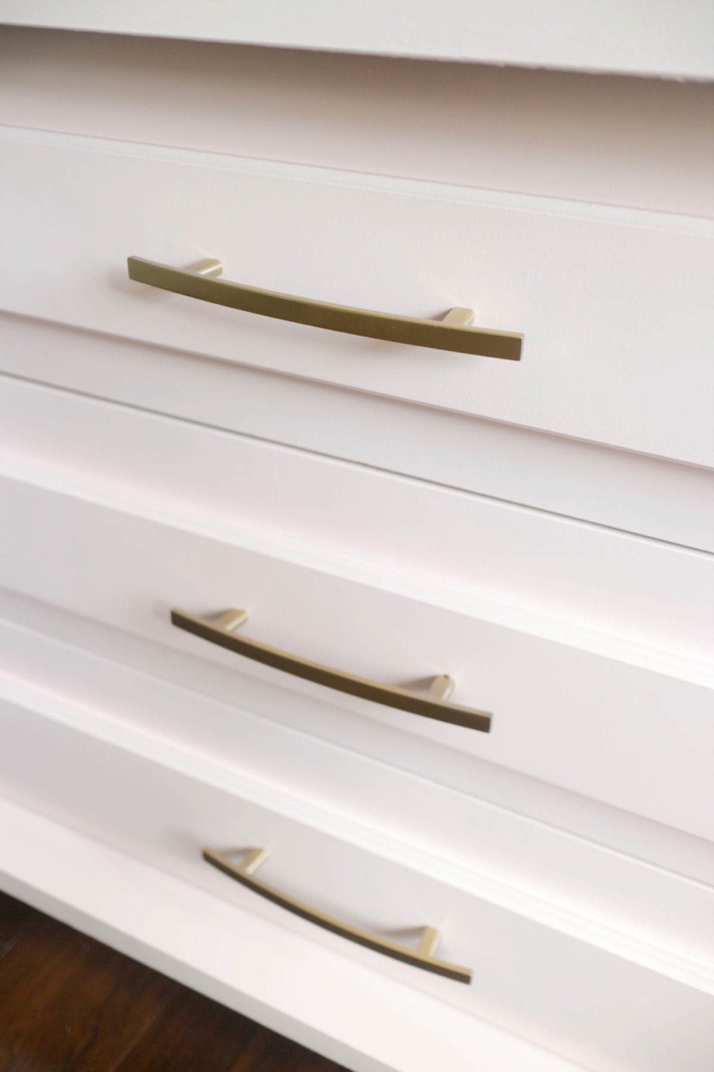 Midcentury modern blush pink dresser with gold by restauredesigns