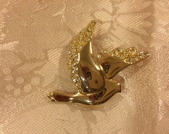 Monet Dove Brooch - gold tone studded in Rhinestone - a beautiful piece.