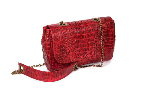 red small clutch bag