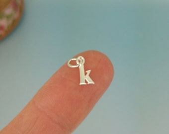 Tiny Sterling Silver Lowercase Initial Charm. Delicate 5-8mm Sterling silver initial charm. Silver Letter Charm. 925 Sterling Alphabet Charm