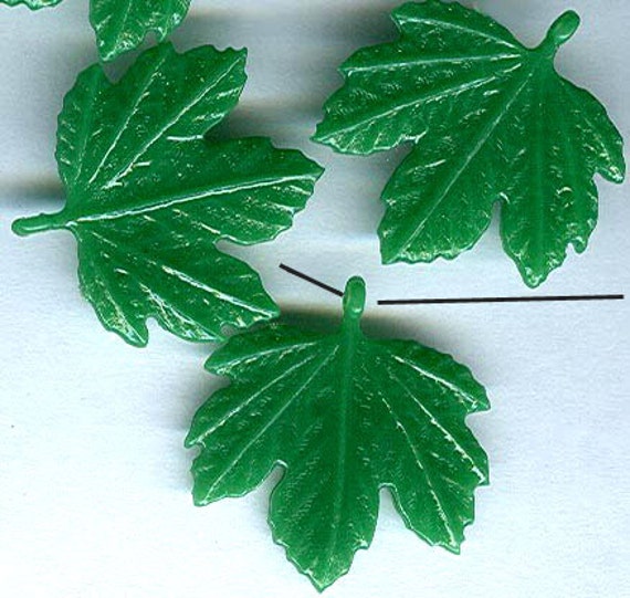 vintage celluloid plastic leaves or leaf beads in bright vintage celluloid plastic leaves or leaf beads in bright