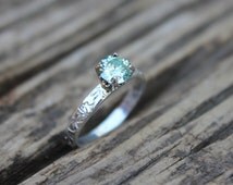 Green moissanite engagement rings