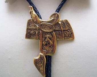 Detailed Vintage Golden Metal Western Saddle Bolo Tie