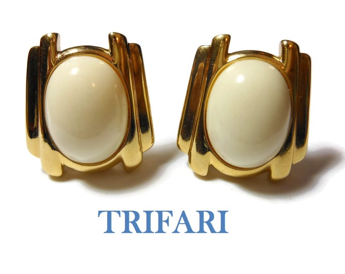 Trifari 1980S earrings, creamy white lucite cabochon, gold columns on sides, clip earring, off white, winter white