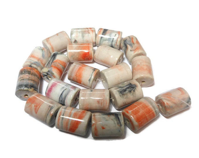 Bead strand, porcelain, 20 marbled white/orange/dark grey tube beads, from 18x14mm to 22x16mm round tube 15-inch strand, 20 beads