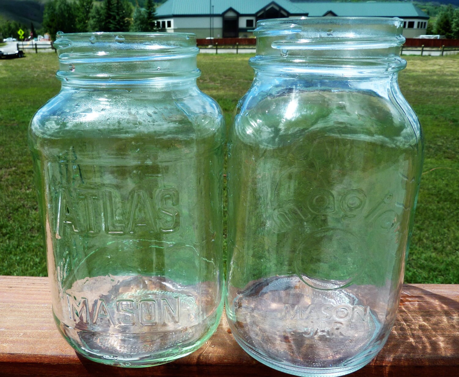 vintage set of 2 clear mason jars Atlas and Magic