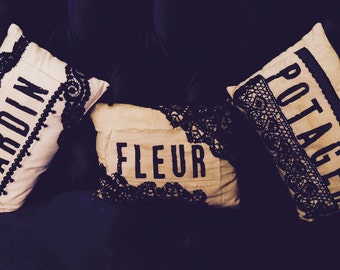 Three, French antique /vintage black lace & soft tea stained cotton pillows.