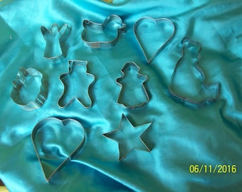 9 vintage metal cookie cutters