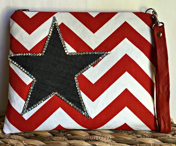 red and white clutch bag