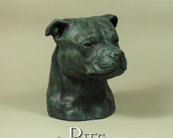 blue staffy statue