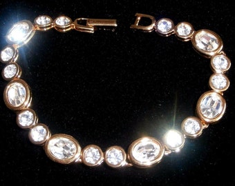 Signed Swarovski Bracelet Gold Plated with Bezel Set Crystals - Swan Logo - 26 grams