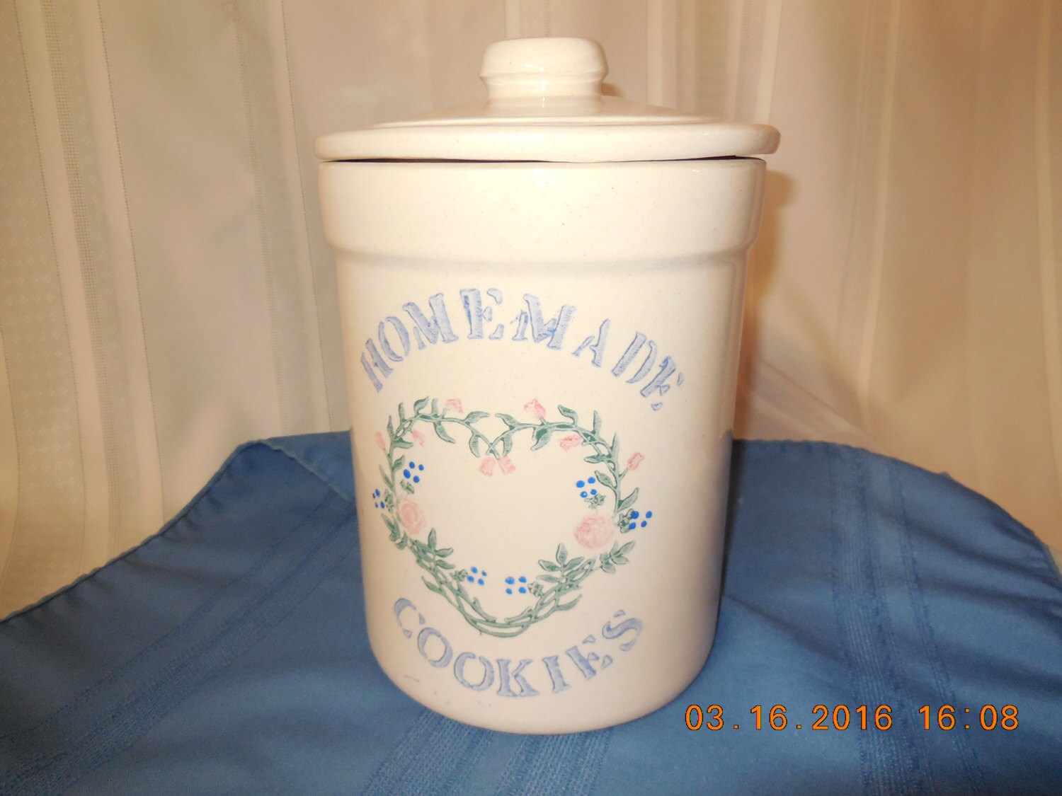 Large ceramic cookie jar with lid.