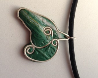 Silver and polymer clay horse head pendant on 18" black cord.