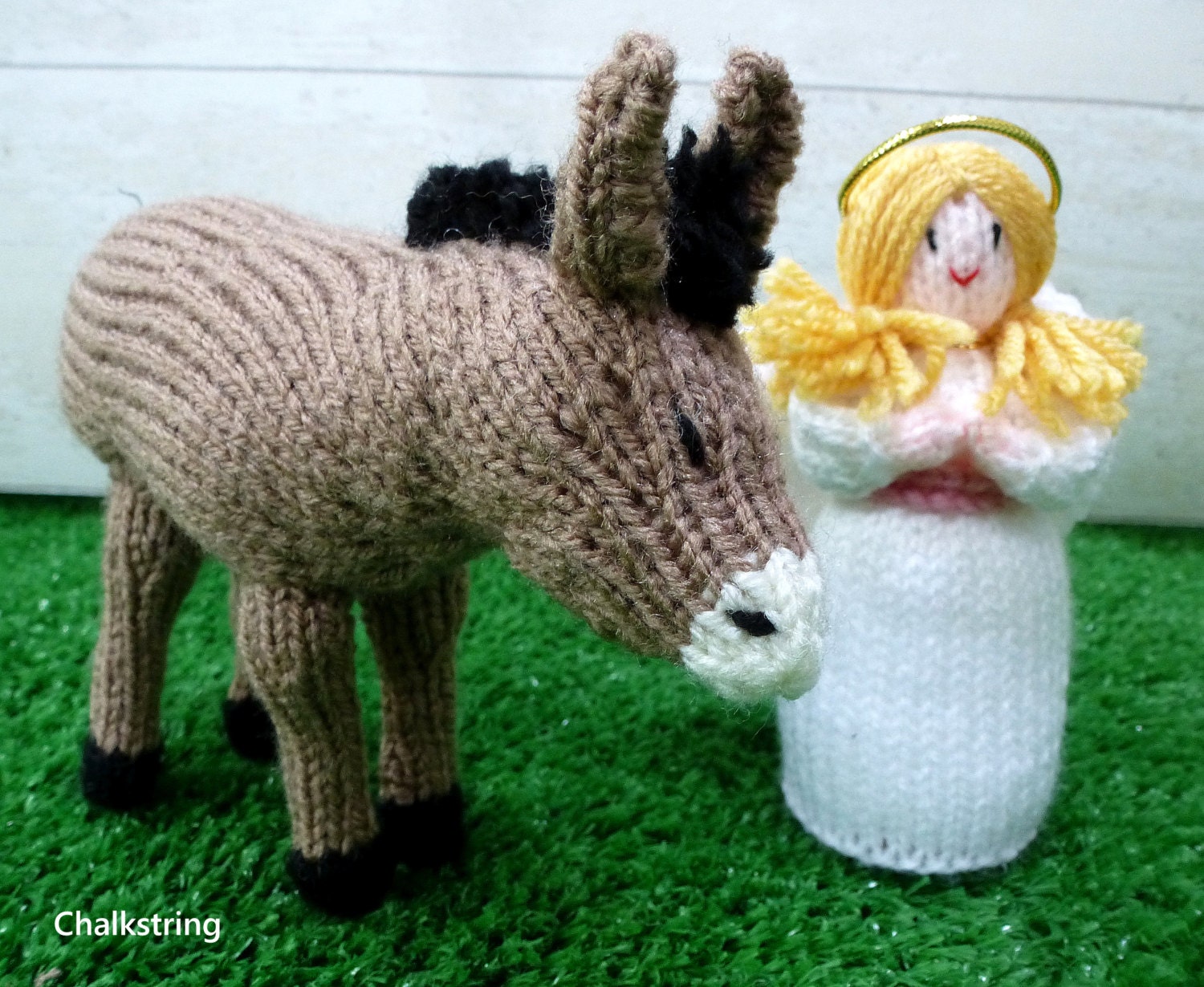 Hand knitted nativity set. Donkey and angel. Christmas