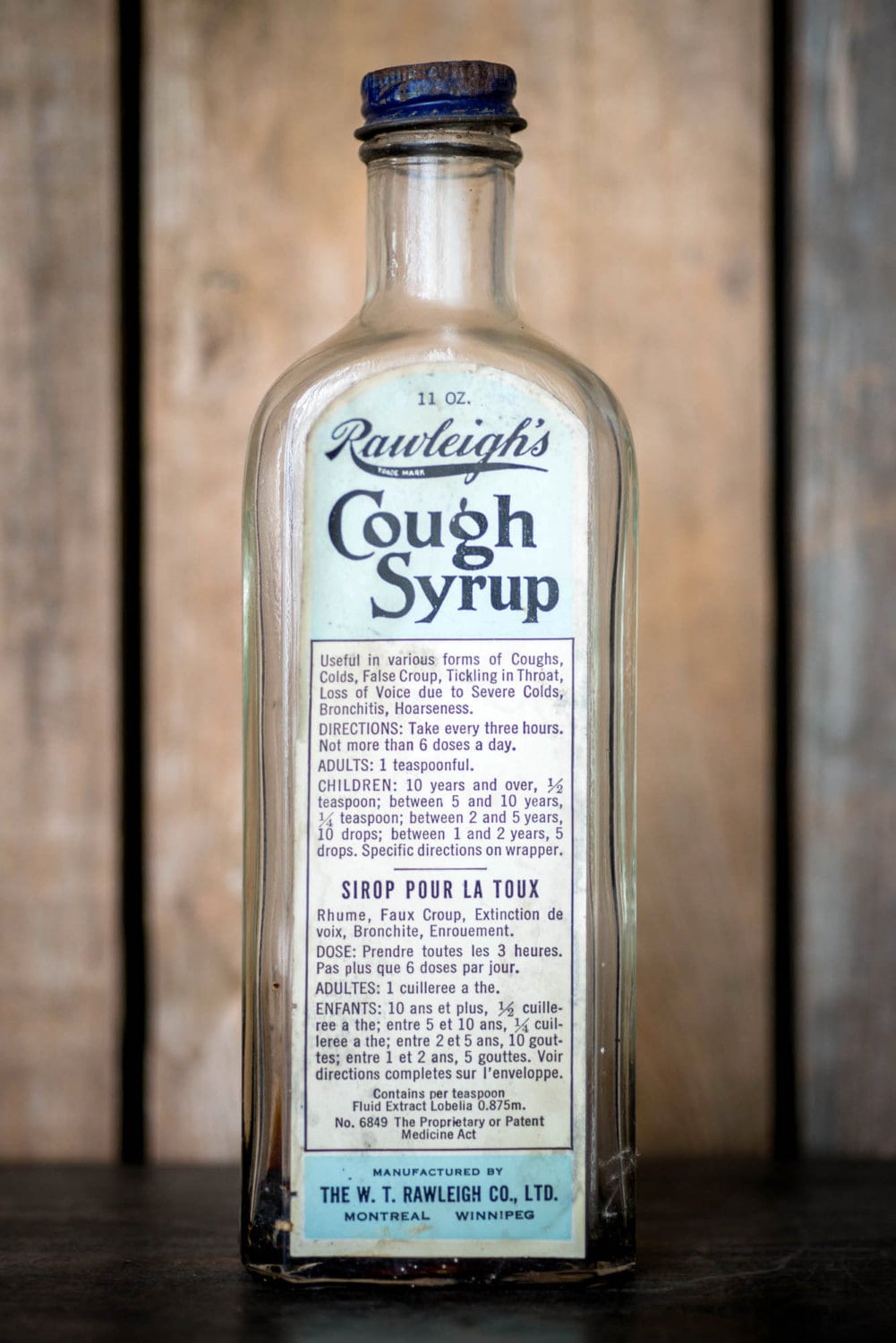 Vintage Rawleigh's Cough Syrup Bottle Embossed Glass