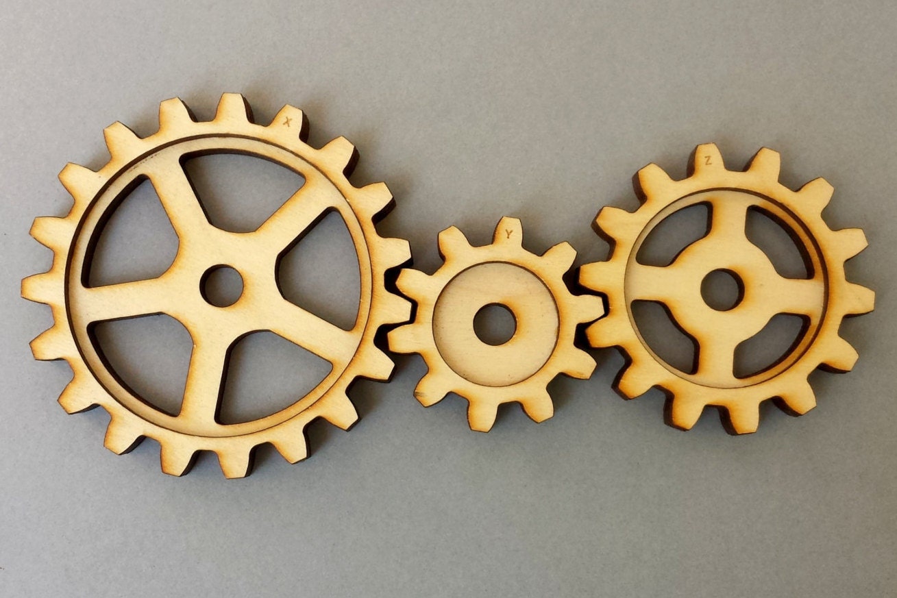 set of 3 working wooden gears. Original art unpainted.