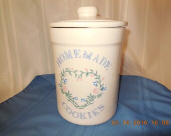 Large stoneware cookie jar with lid.