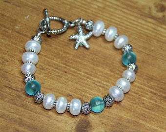 Items similar to 5 Strand Puka Shell Mother of Pearl Turquoise Pearls ...