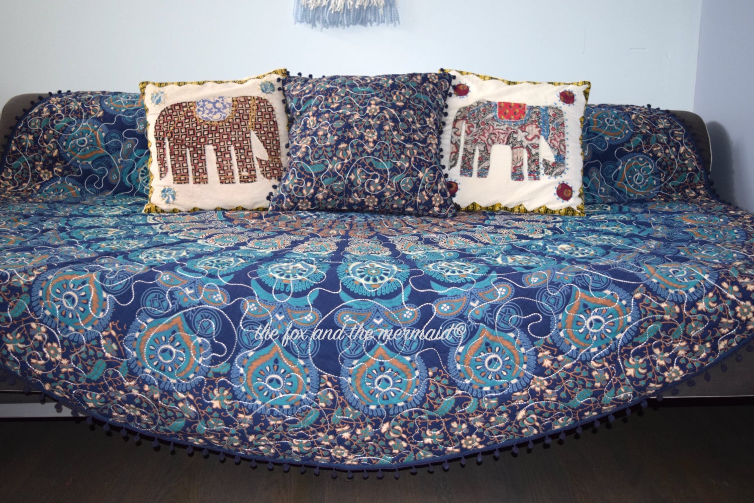 Round mandala quilt with pompoms and matching pillow