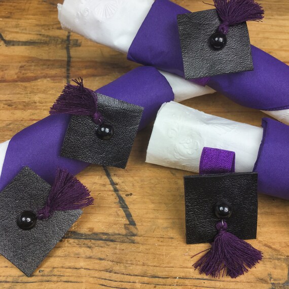 Graduation Cap Napkin Rings Includes 3 piece plastic by JuijuiCo
