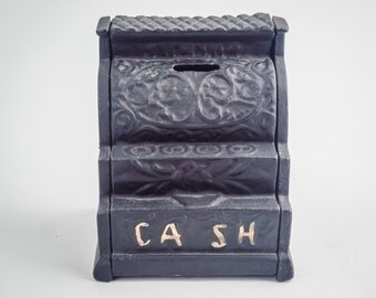 Antique cast iron still bank.