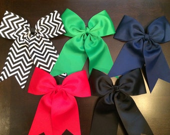 Items similar to Multi colored balloon bow on Etsy